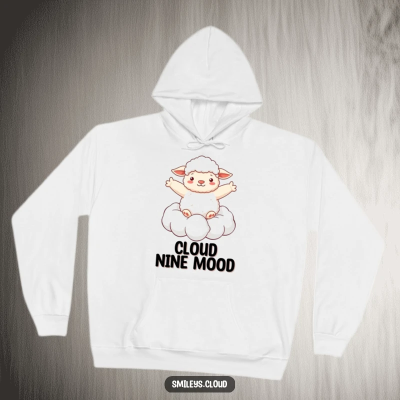 Funny hoodie depicting a fluffy sheep blissfully floating on a cloud with arms spread wide, capturing a moment of pure, dreamy relaxation.