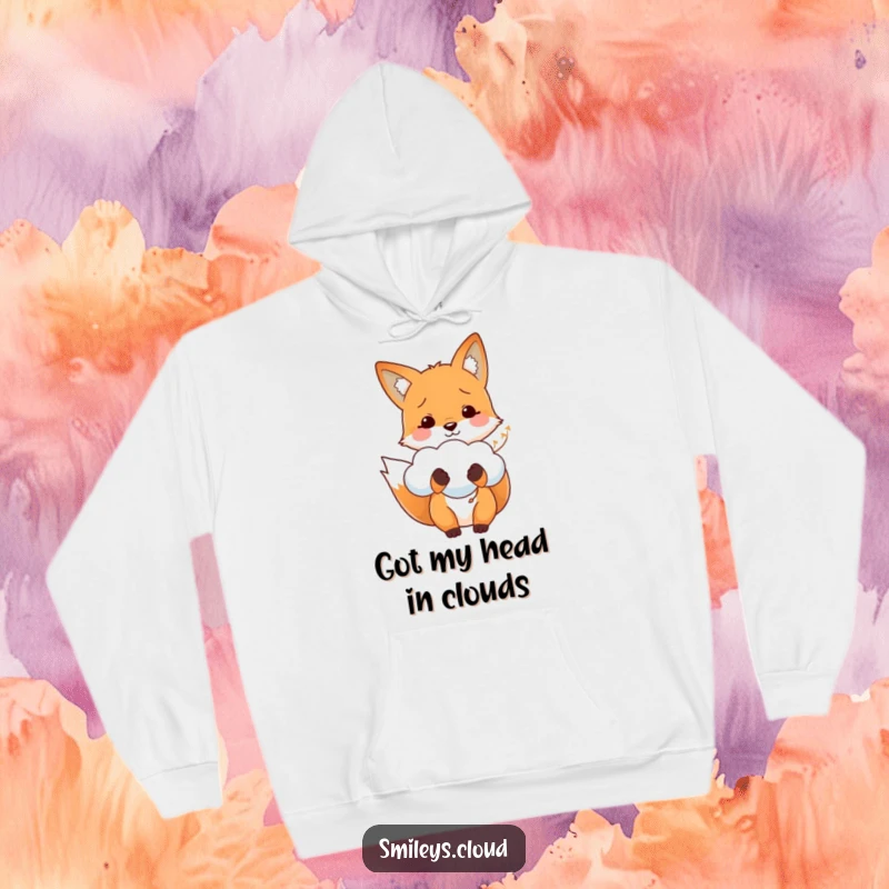 Funny hoodie showcasing a smiling fox gently holding a cloud like a precious balloon, evoking warmth and wonder.