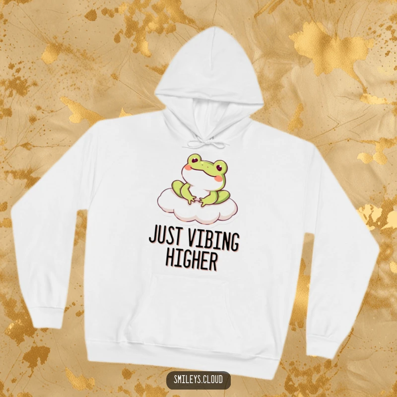Funny frog character chilling on a cloud, radiating contentment on this warm and humorous hoodie.
