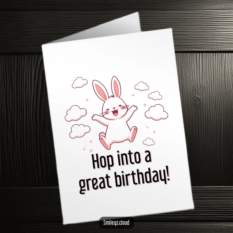 Funny Free Printable Birthday Card: Happy rabbit joyfully leaping between scattered clouds with energetic excitement and a big smile.