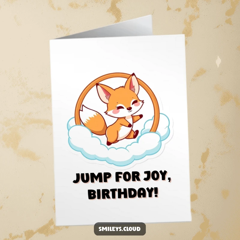 Funny Free Printable Birthday Card: Playful fox leaping energetically through a cloud hoop, celebrating a birthday.