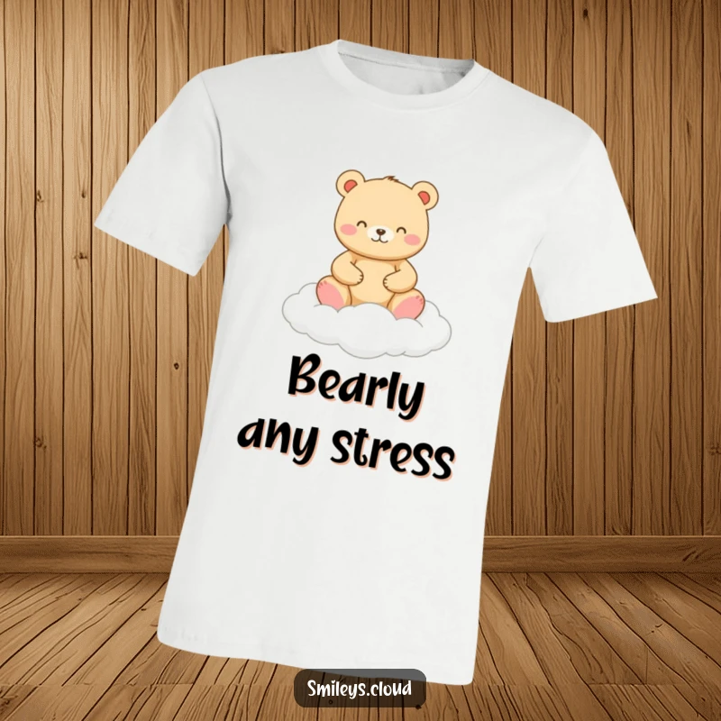 Funny t-shirt featuring a joyful bear meditating cross-legged atop a soft, white cloud, exuding peace and humor.